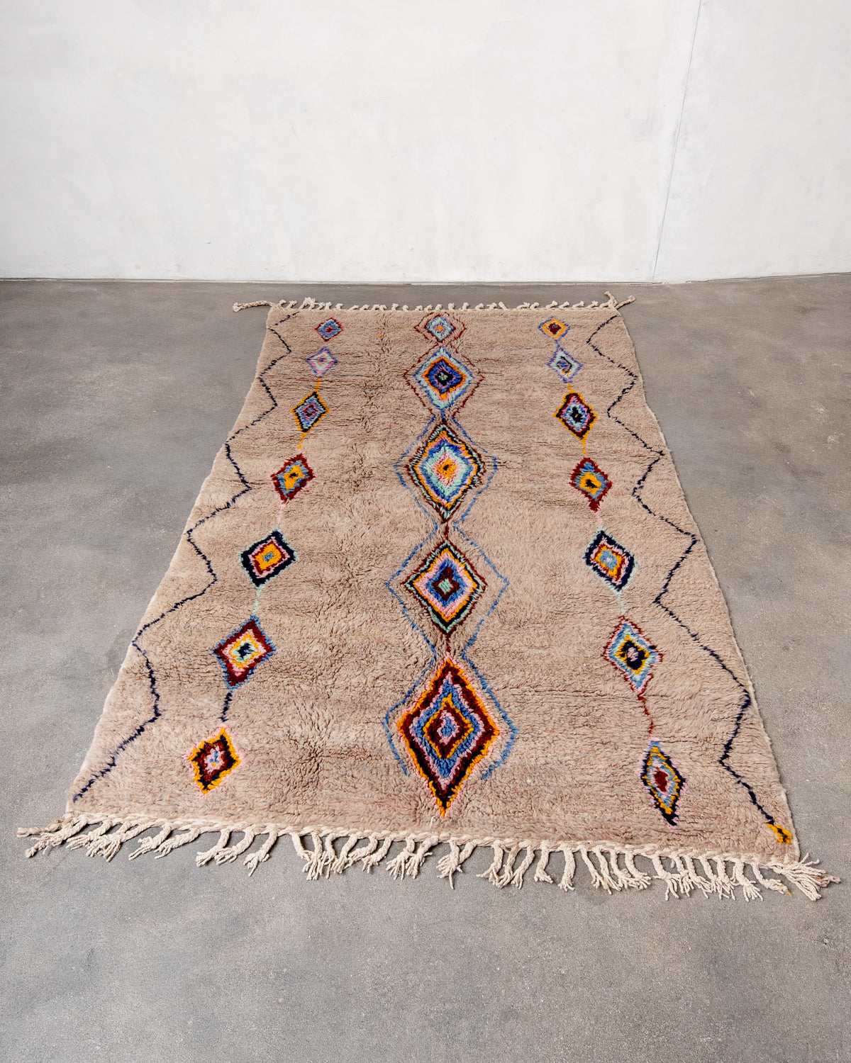 Modern, designer, handcrafted Berber runner rug from Morocco. Beniourain carpet with beautiful colours and patterns and fluffy wool texture.